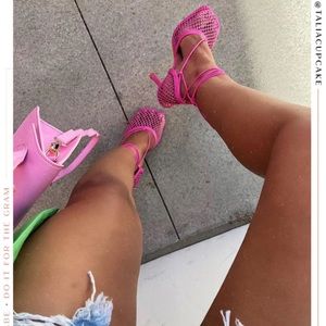 Miss Lola Pink fishnet heels.. Brand new never worn